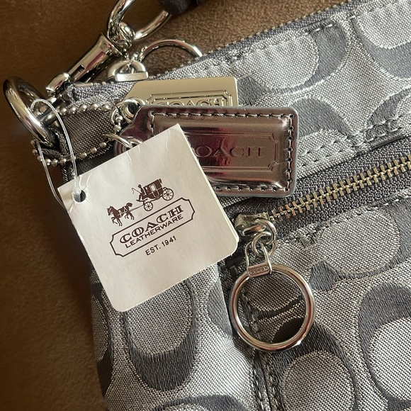 Coach Poppy Signature Crossbody Bag
NWT - Picture 3 of 4